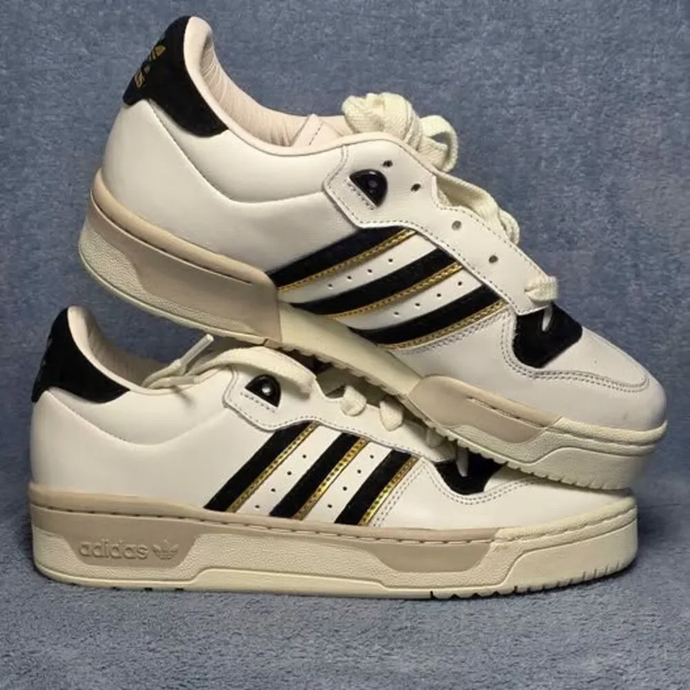 Adidas Rivalry 86 Low white black gold stripes Mens US 7 or Womens US 8